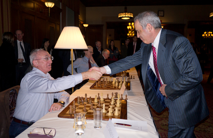 rex-garry-handshake-jan11-2012-700.jpg