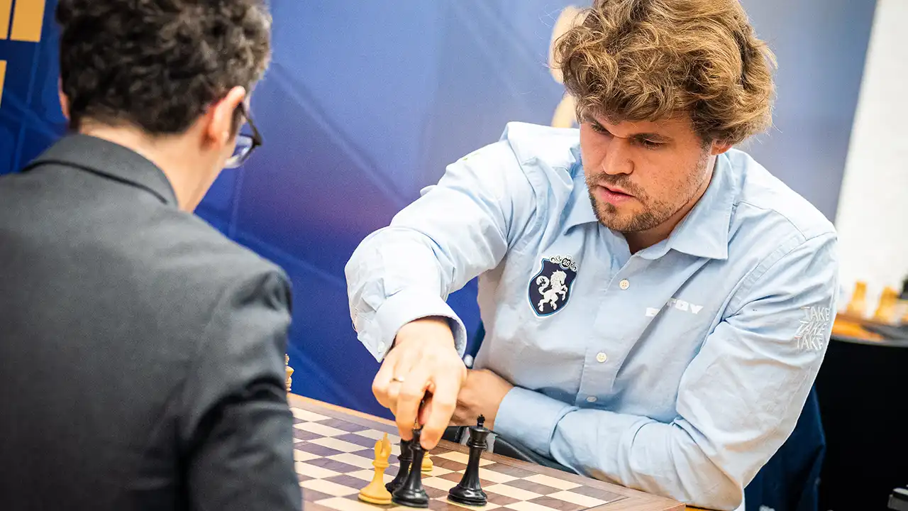 photo - Day 3 of the 2025 Clutch Chess Champions Showdown featuring GM Magnus Carlsen playing chess against GM Fabiano Caruana - LOU08849