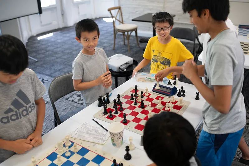stl select chess camp kids playing chess