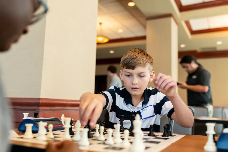 Youth learning chess